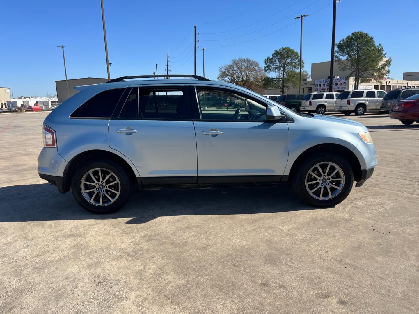 2008 blue /black Ford Edge SEL FWD (2FMDK38C98B) with an 3.5L V6 DOHC 24V engine, 6-Speed Automatic Overdrive transmission, located at 14700 Tomball Parkway 249, Houston, TX, 77086, (281) 444-2200, 29.928619, -95.504074 - Photo#7